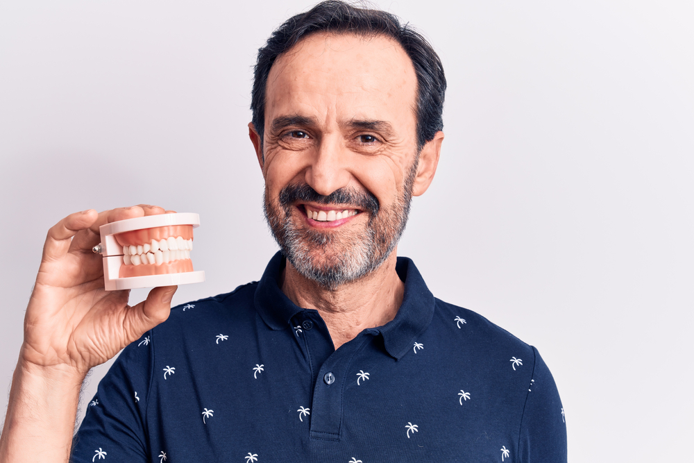 Dentures vs. Implants for Seniors: Pros and Cons